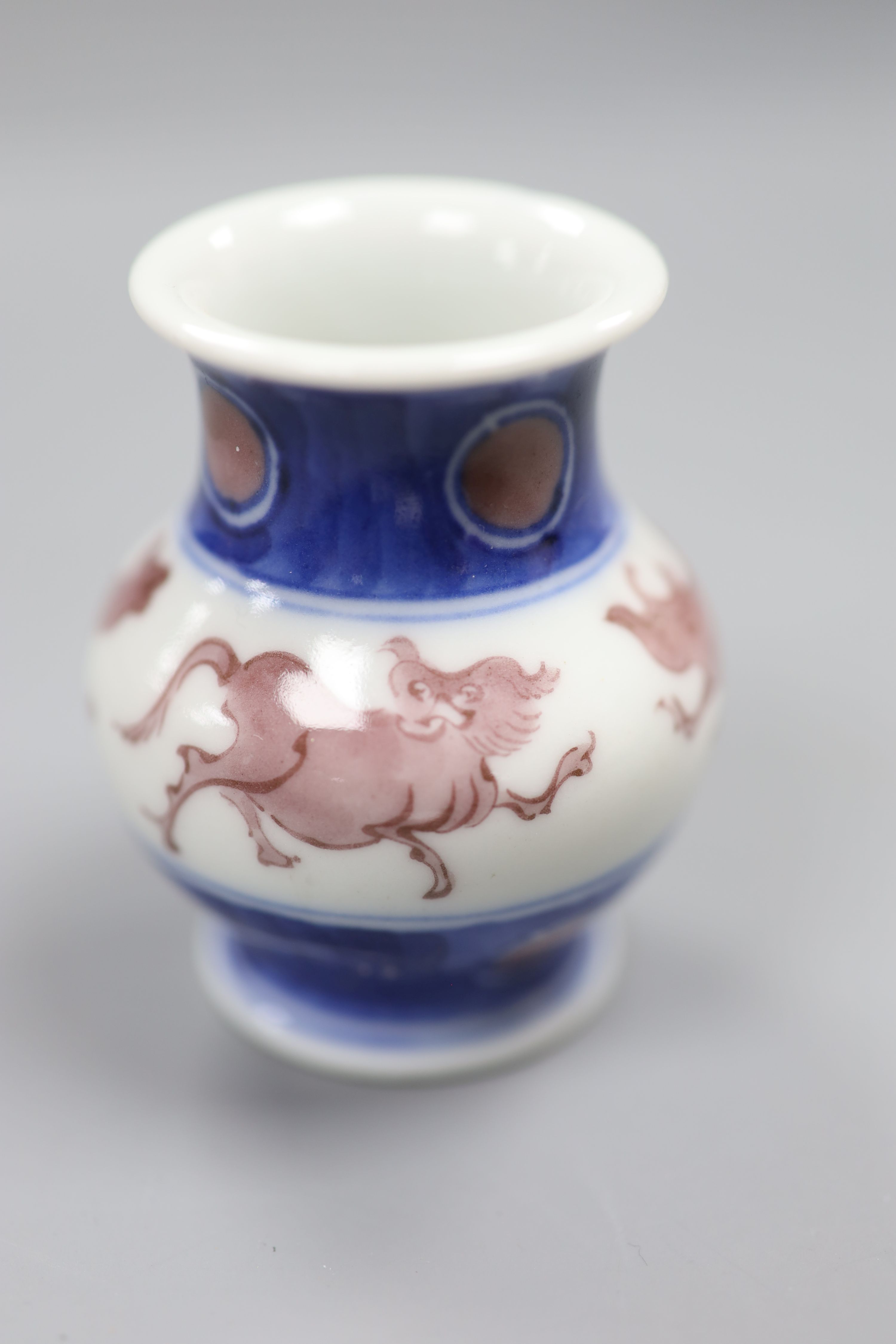 Makuzu Kozan. An underglaze blue and copper red small jar, height 6.5cm